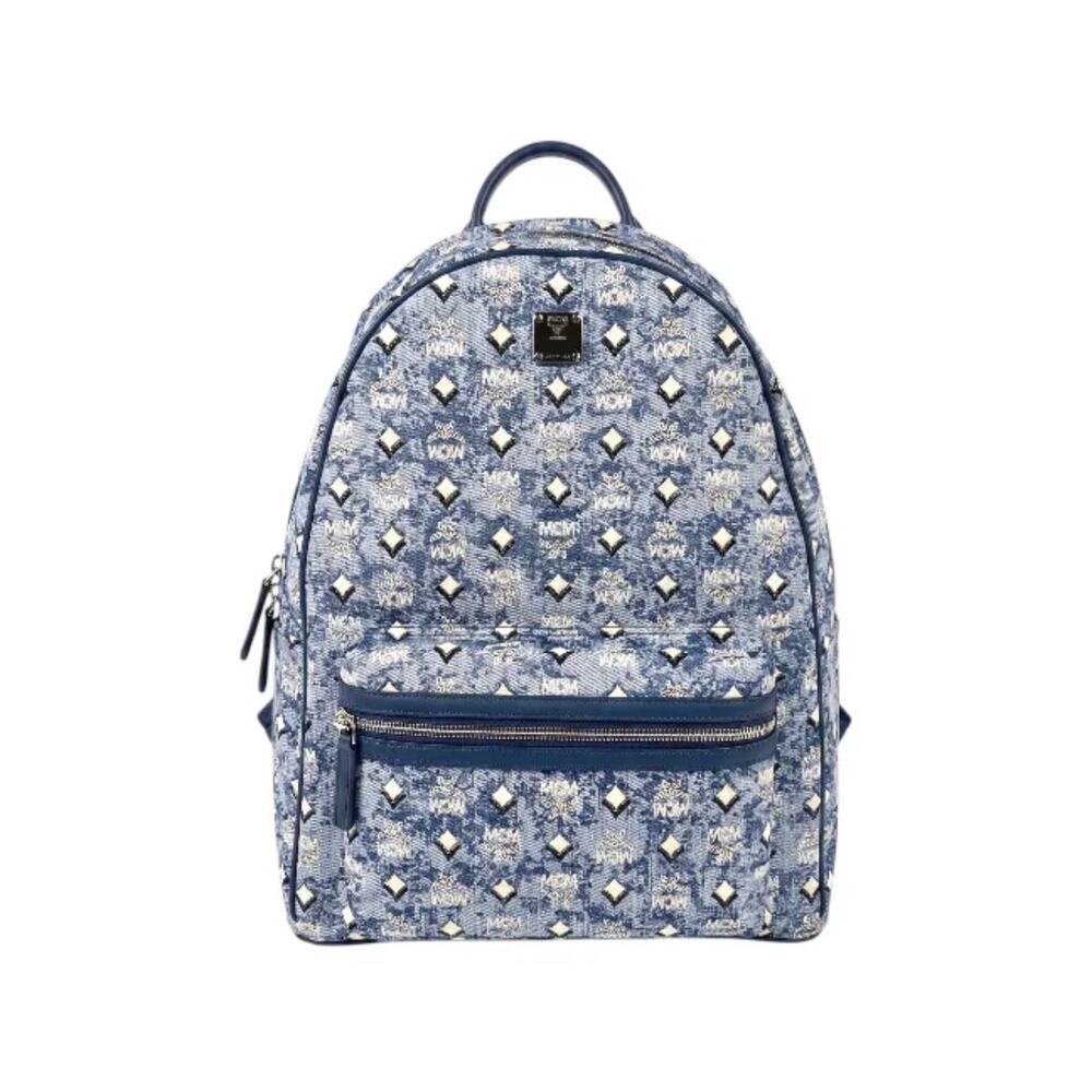 MCM Stark Backpack in a blue denim-style monogram finish